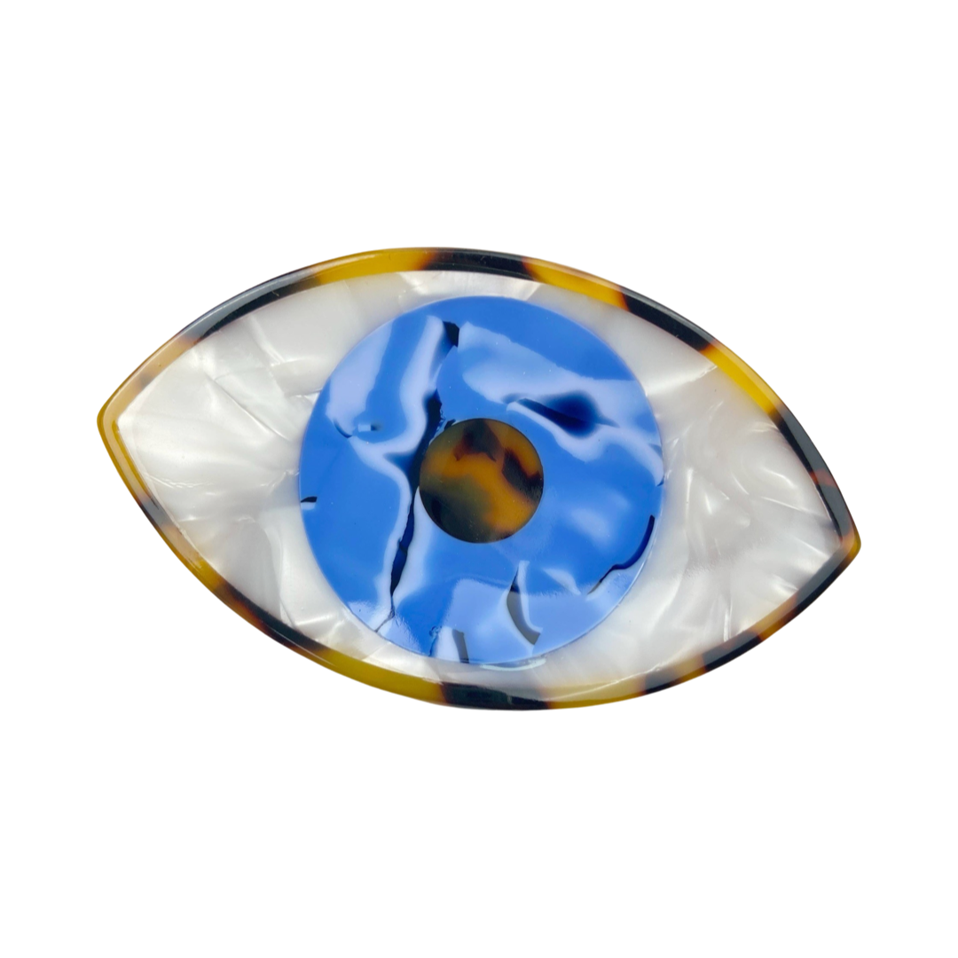 evil eye hair claw clip featuring a blue eye and brown outline