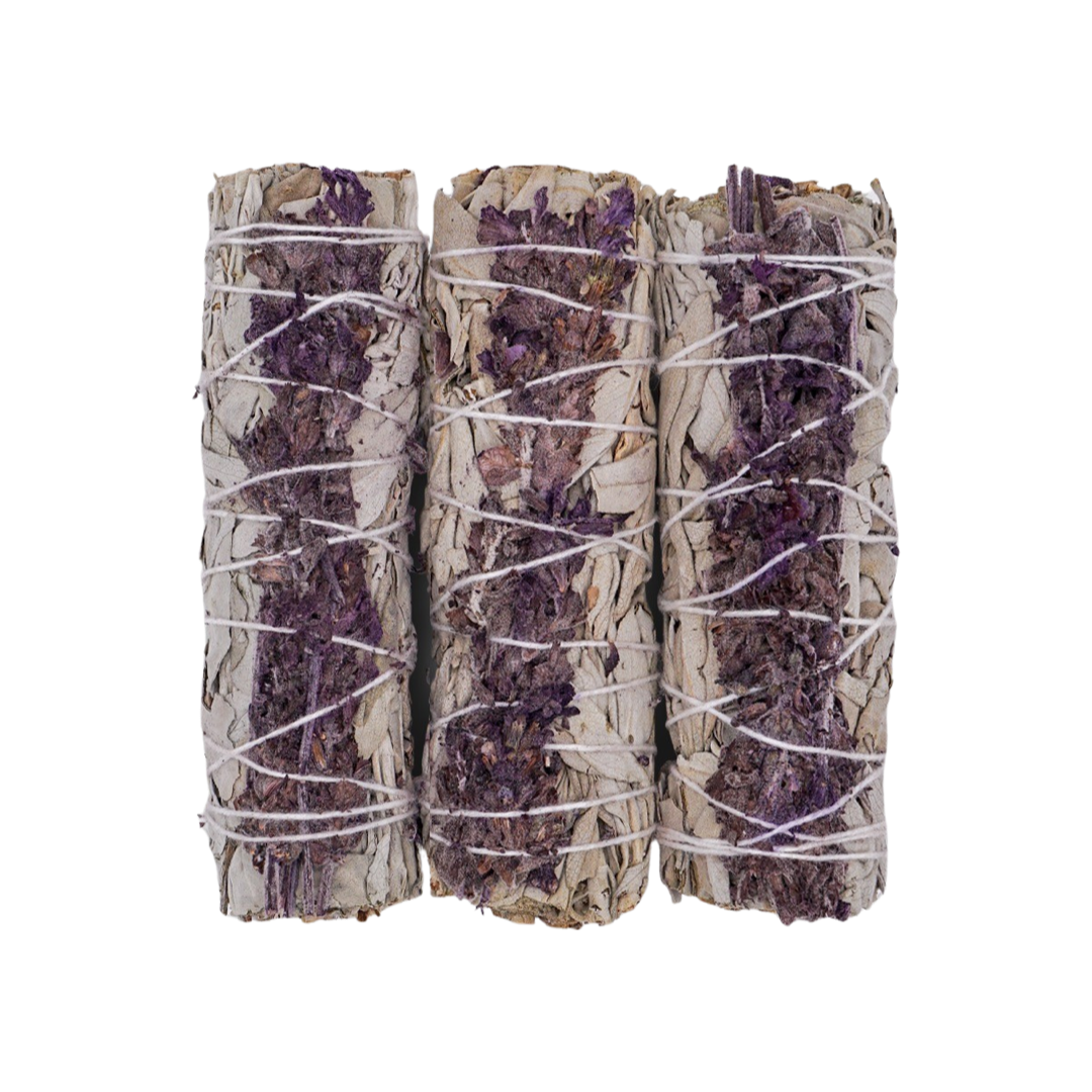 three sage bundles with lavender and tied with white twine