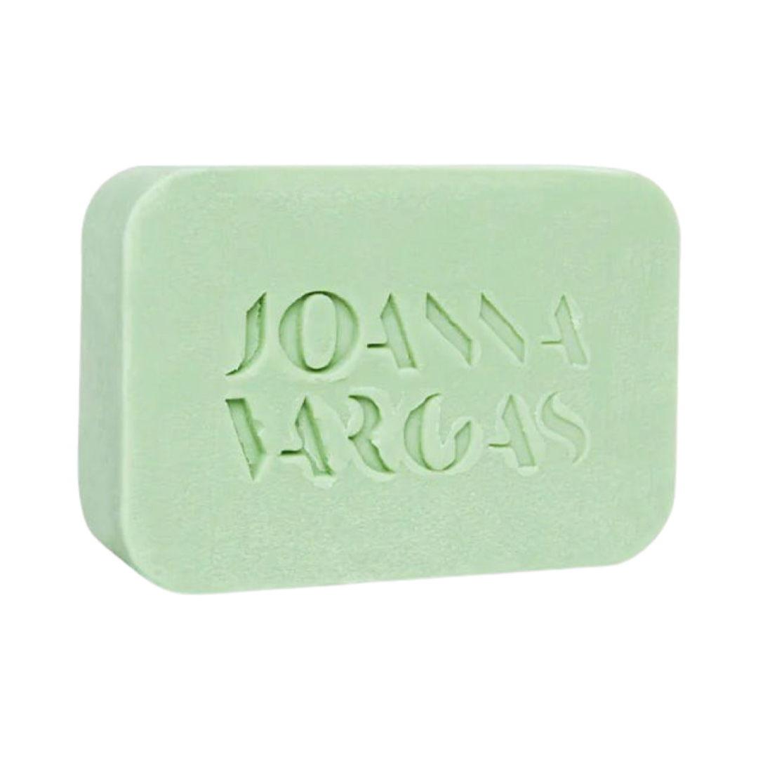 light green bar of soap with the brand name Joanna Vargas etched in the center. Brand: Joanna Vargas