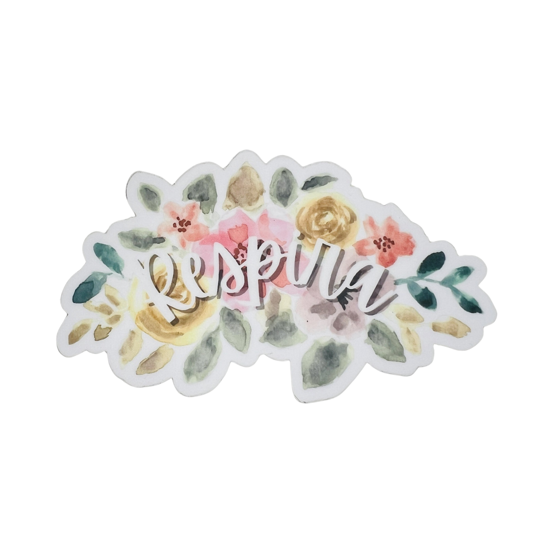white sticker with muted pastel colored flowers and the word Respira in white lettering