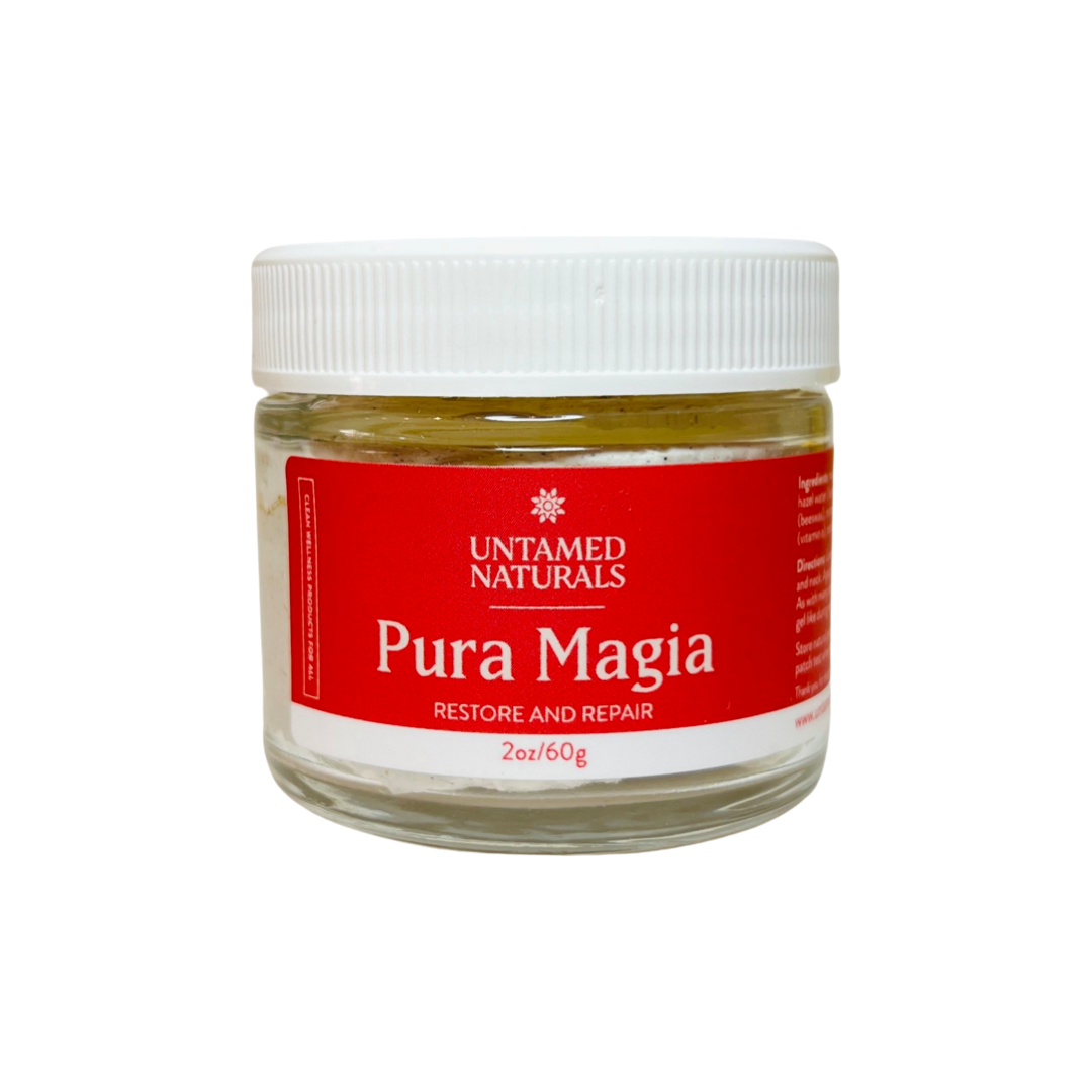 clear 2 oz jar of pura magia with a red branded label with white lettering. Brand: UnTamed Naturals