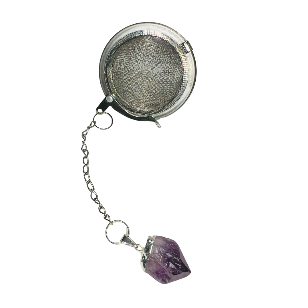 stainless steel round tea infuser with an amethyst charm