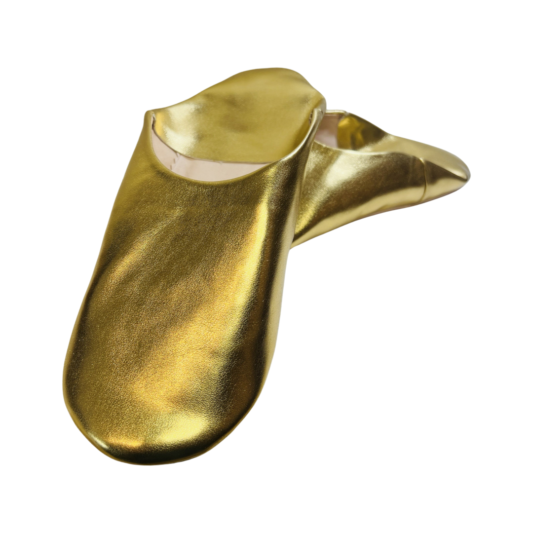 gold pair of moroccan leather babouche slippers