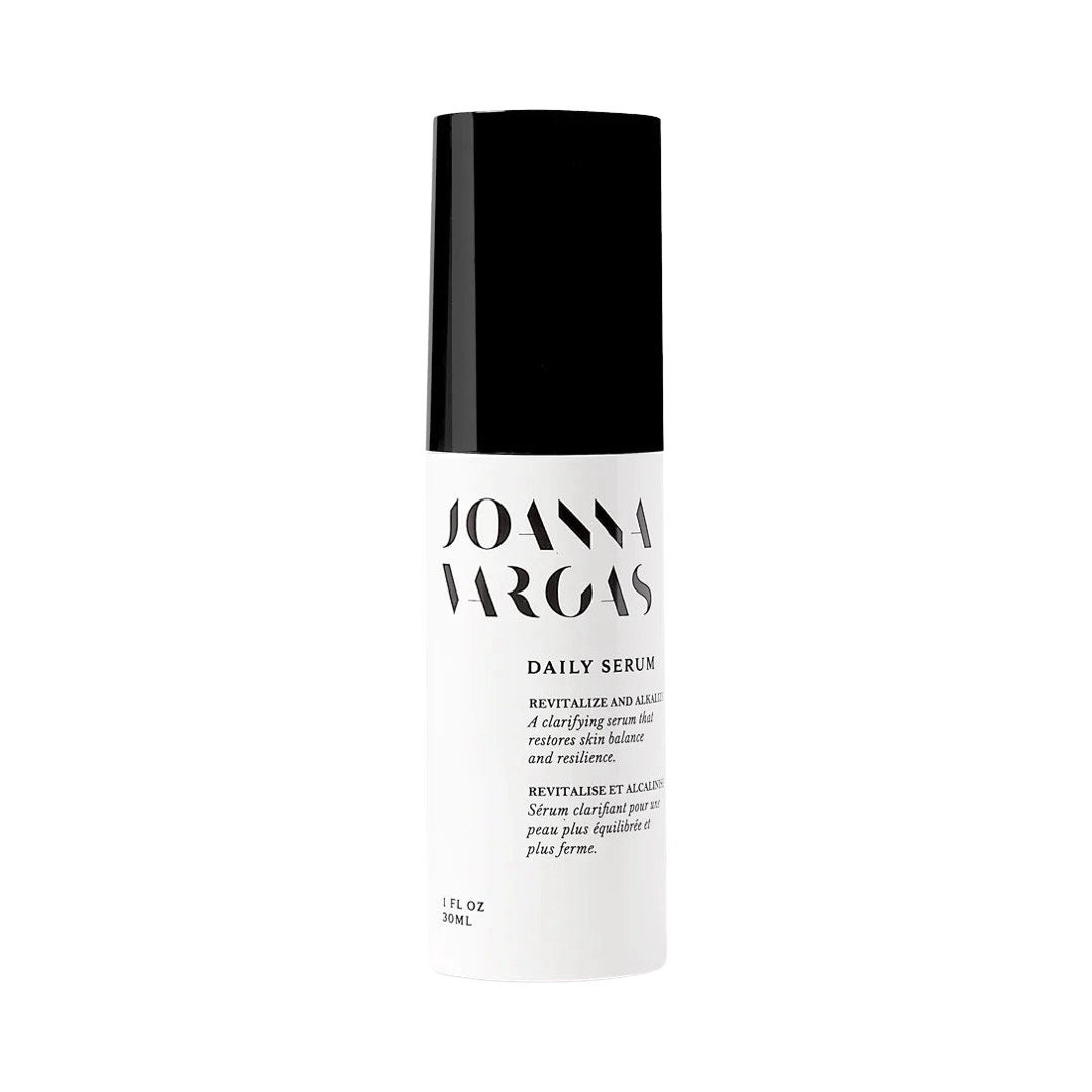 1 fl oz white tube of a daily serum with a black lid and black lettering. Brand: Joanna Vargas