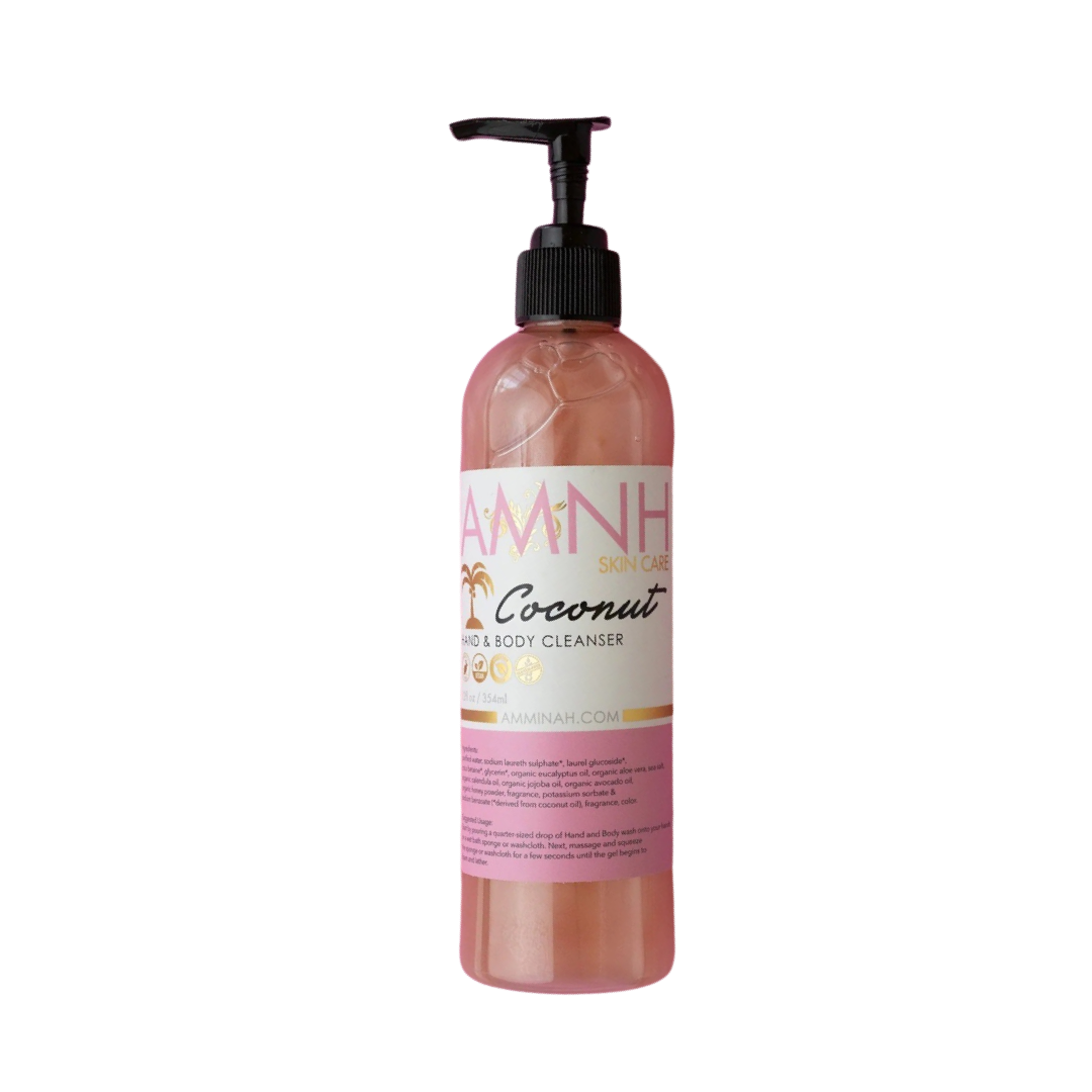 12 oz clear bottle of pink coconut body cleanser with a white branded label featuring an image of a gold palm tree. Brand: Aminnah