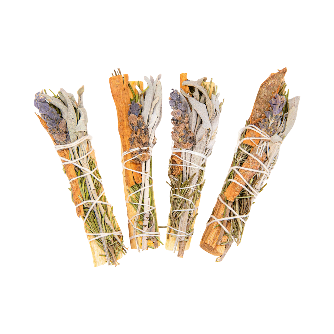 four palo santo bundles with lavender, white sage, cinnamon and rosemary