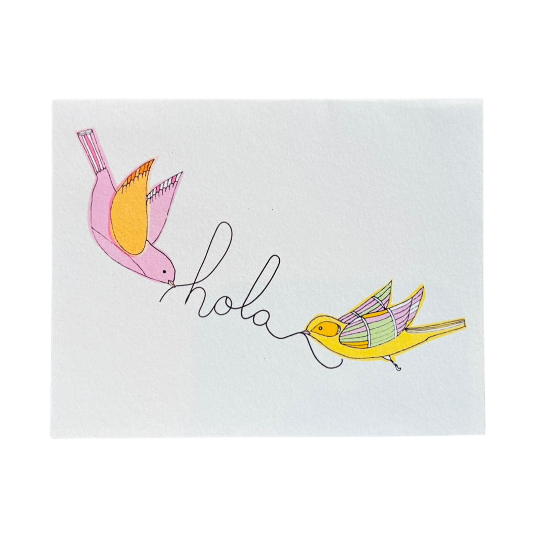 white card with a sketch of two pink and yellow birds holding a thread that spells out the word Hola.