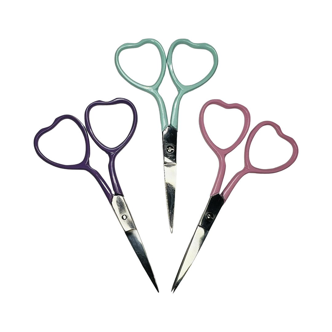 3 pairs of scissors with heart shaped handles in the following colors: purple, pink lilac, mint