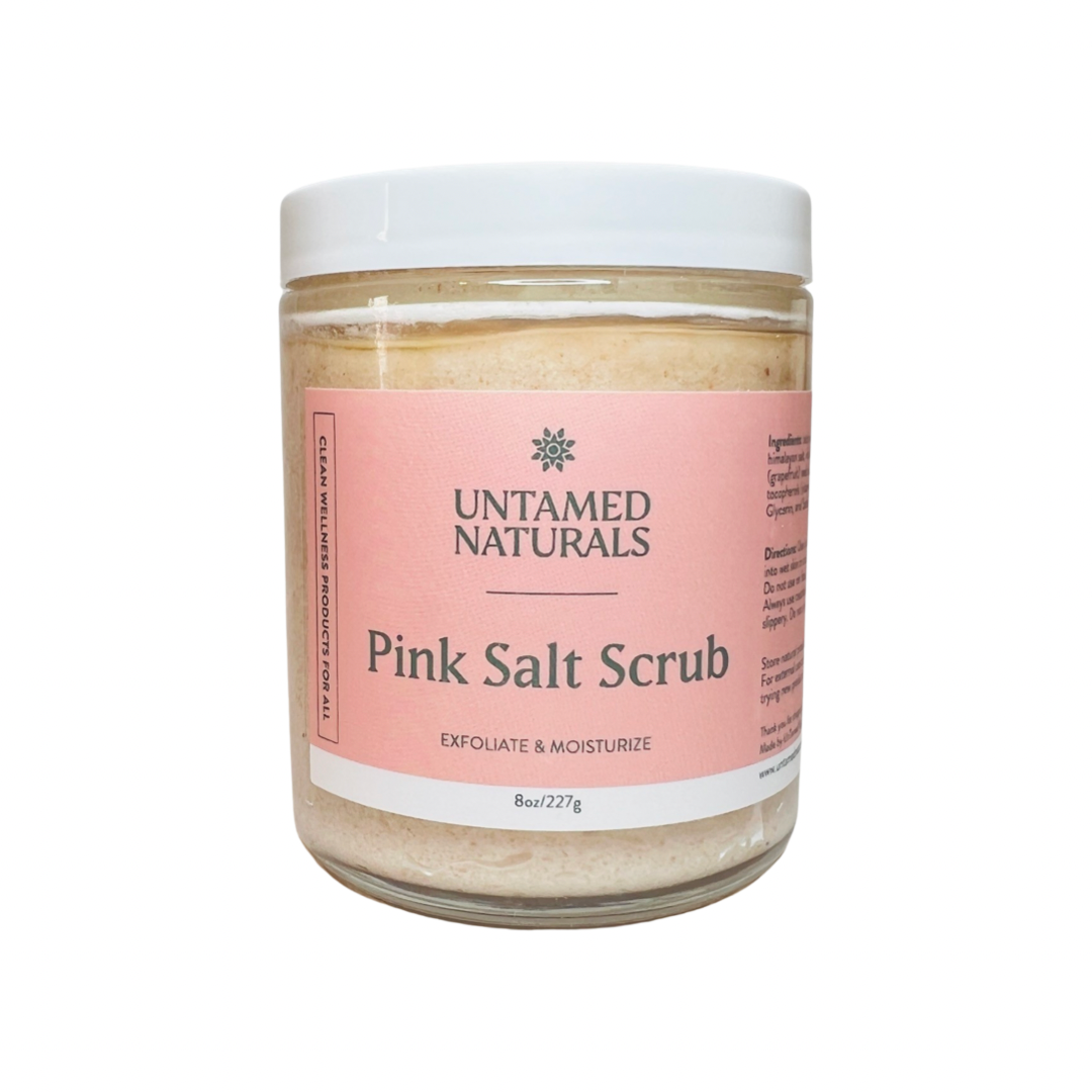 clear 8 oz jar of pink salt scrub with a pink branded label and green lettering. Brand: UnTamed Naturals