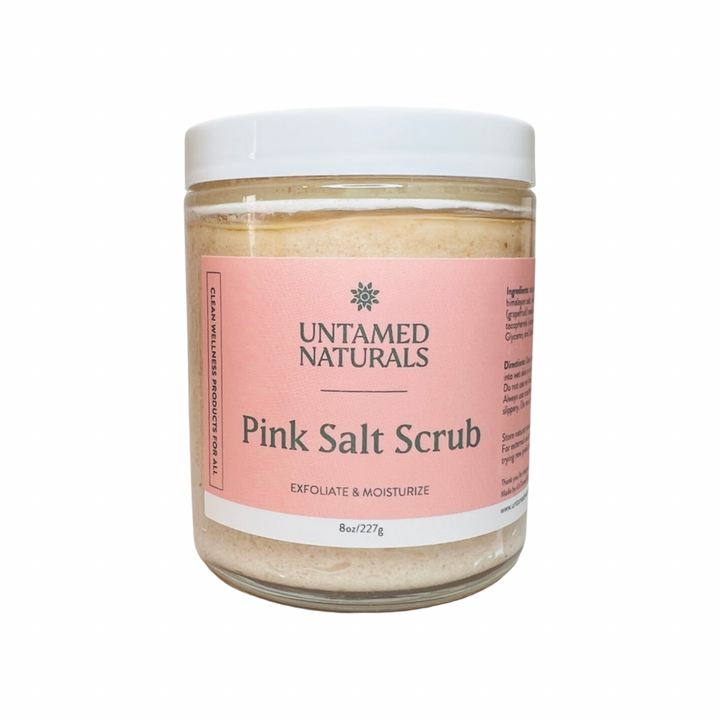 clear 8 oz jar of pink salt scrub with a pink branded label and green lettering. Brand: UnTamed Naturals