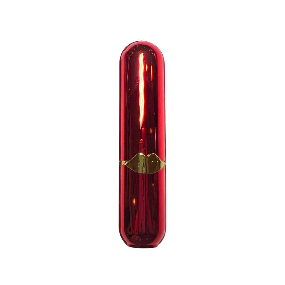 A red lipstick-shaped lighter with a glossy finish and a gold lip-shaped accent at the center.