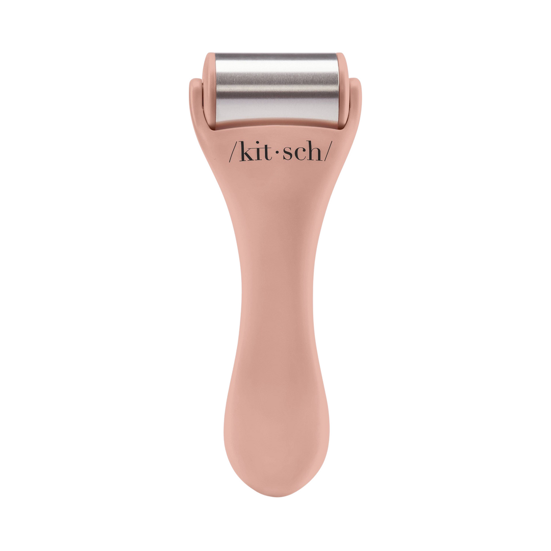 a soft pink ice roller with the name kitsch in black letter under the steel roller. Brand: Kitsch