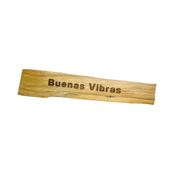 palo santo engraved with the phrase Buenas Vibras (good vibes)