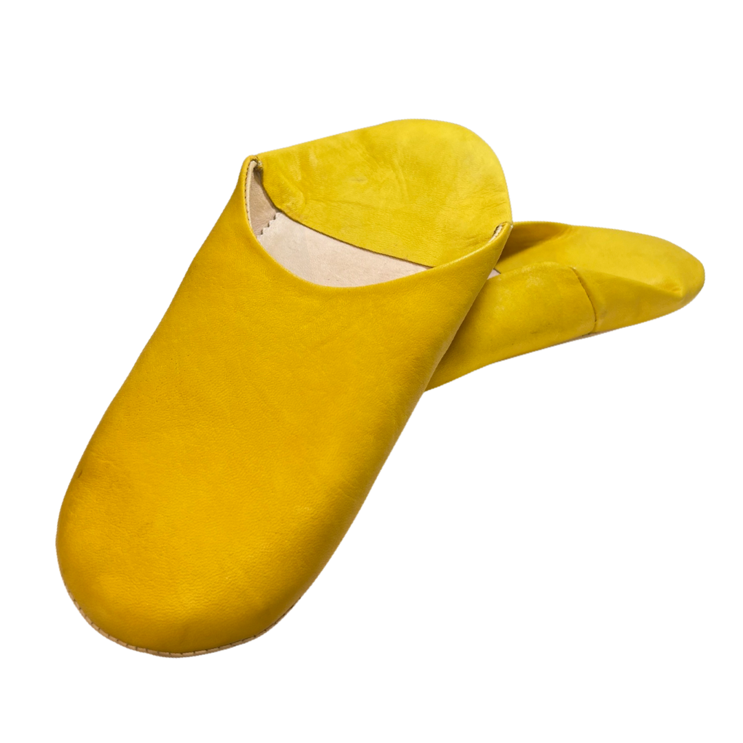 yellow pair of moroccan leather babouche slippers