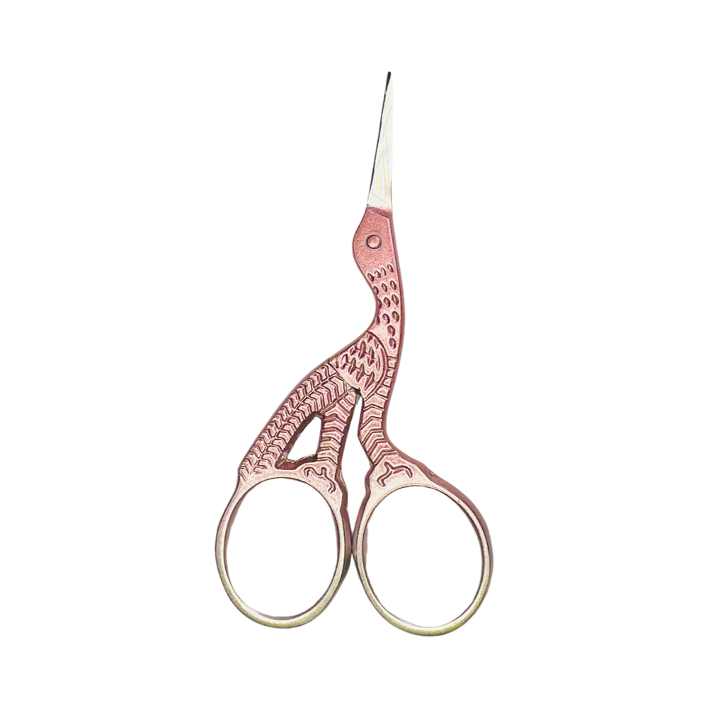 light pink stork shaped scissors