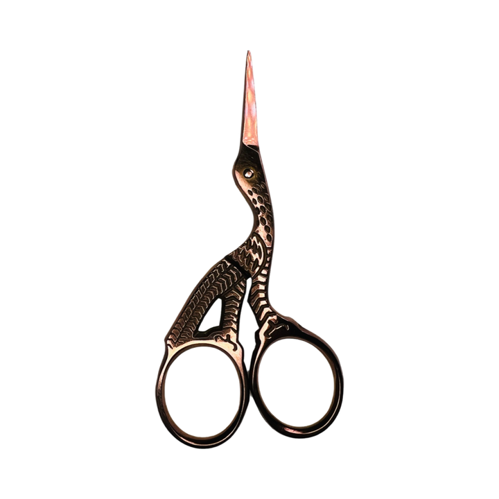 copper stork shaped scissors