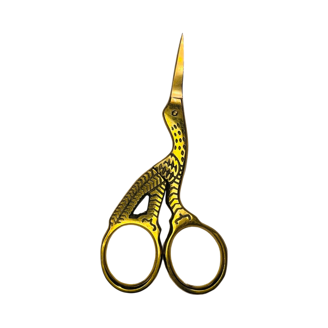 gold stork shaped scissors