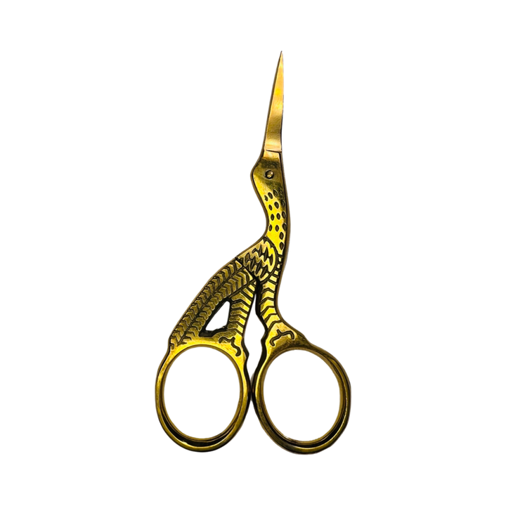 gold stork shaped scissors
