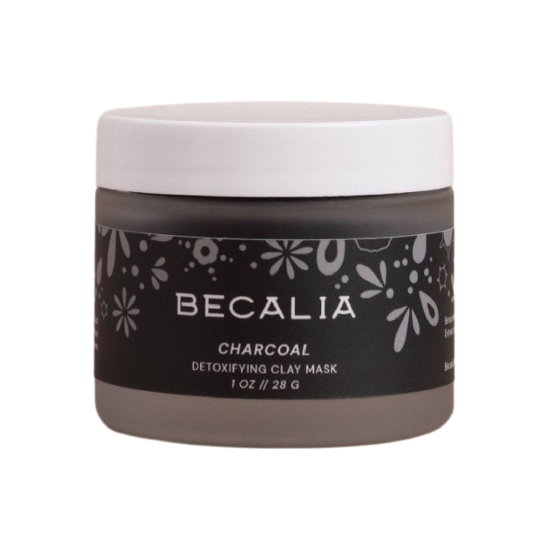 frosted 1 oz jar of charcoal clay mask with a black branded label. Brand: Becalia Botanicals