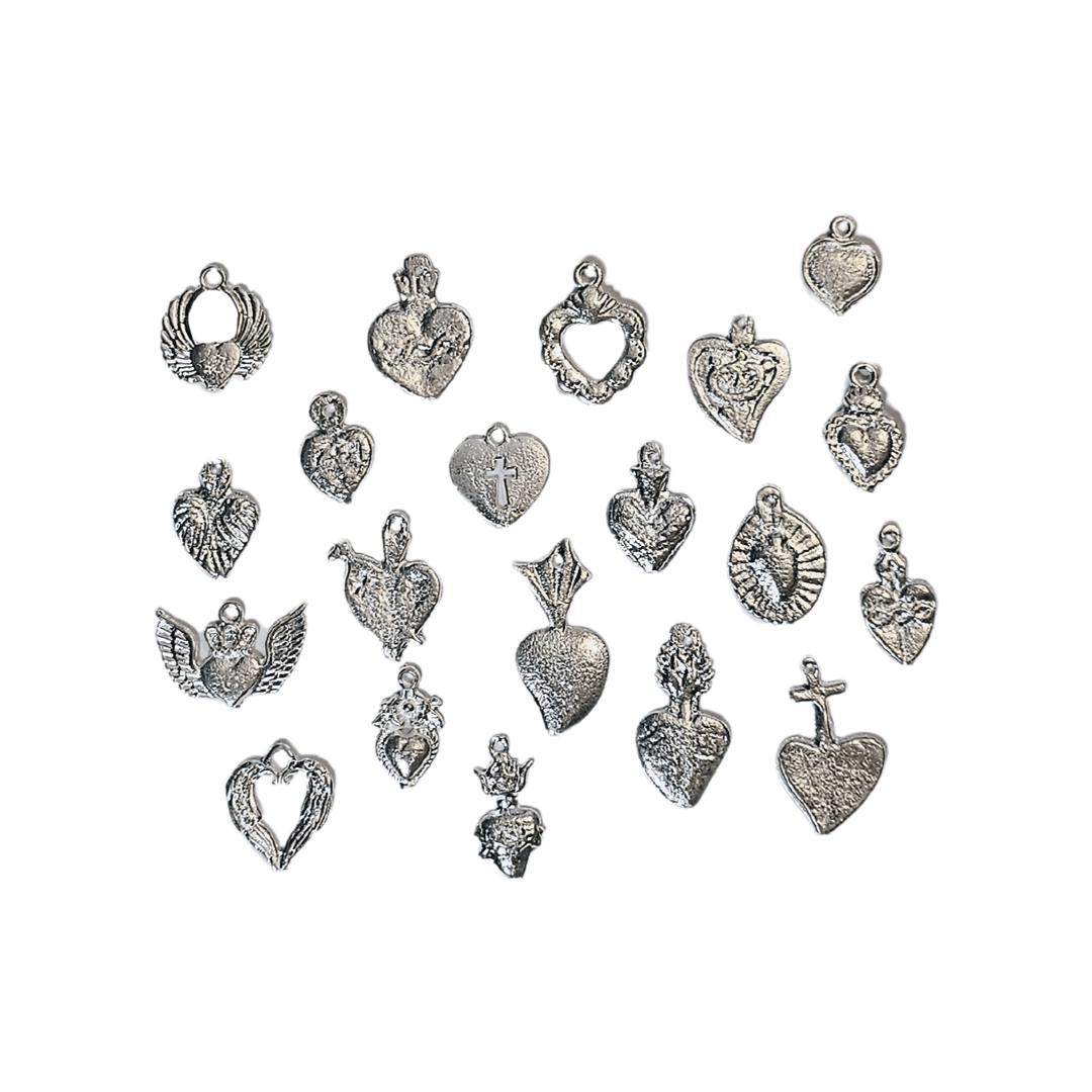 20 silver milagro charms in various styles of hearts