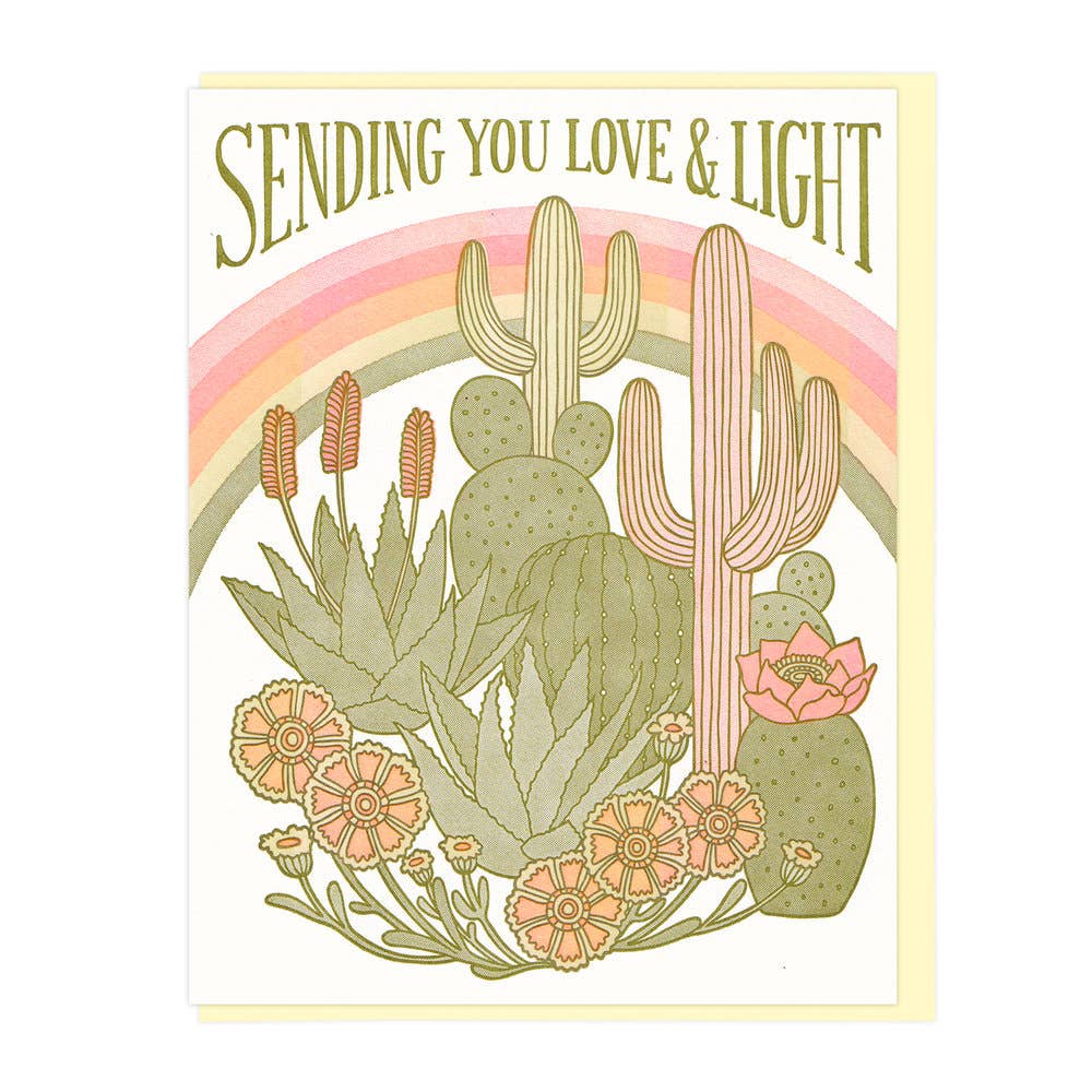 White card with illustrations of various types of cacti and flowers with a rainbow featuring the phrase Sending You Love And Light in green lettering