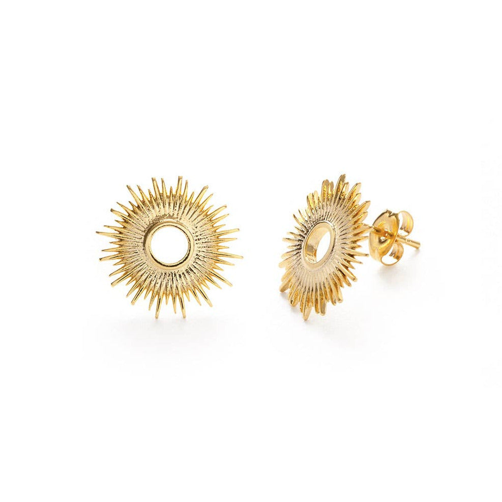 set of gold sun burst earrings featuring a center hole. Brand: Amano Studio
