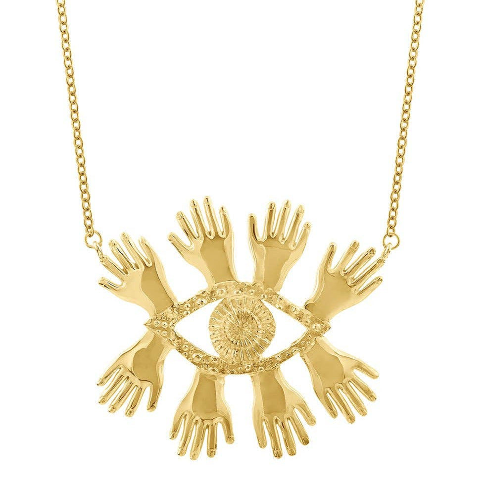 gold pendant necklace that features an eye with 8 hands coming out from the eye with a gold chain. Brand: Sophie Simone