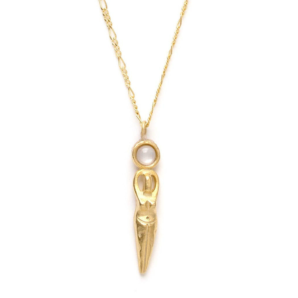 close up view of a gold Selene pendant necklace featuring a round crystal. Brand: Amano Studio