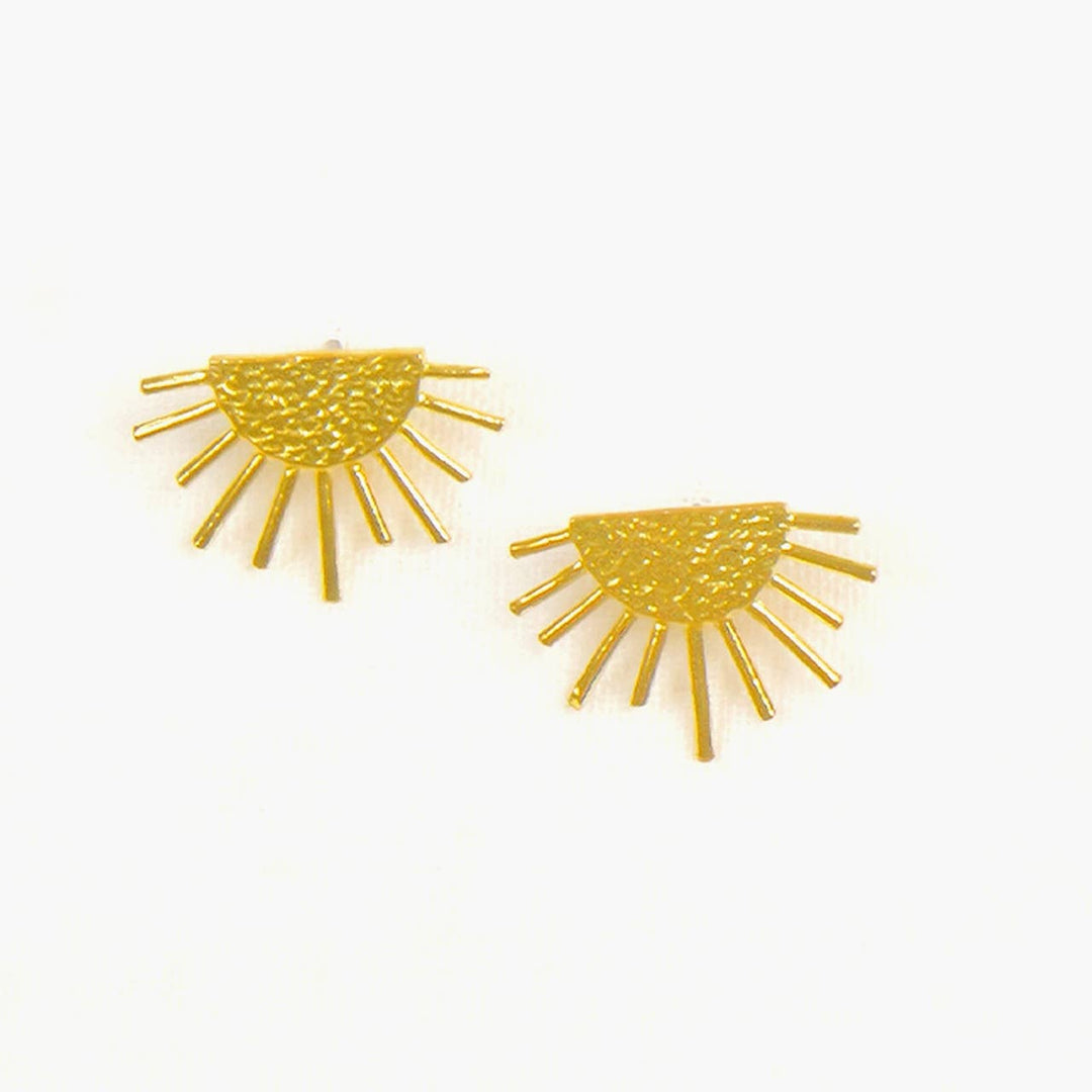 set of gold sun burst earrings