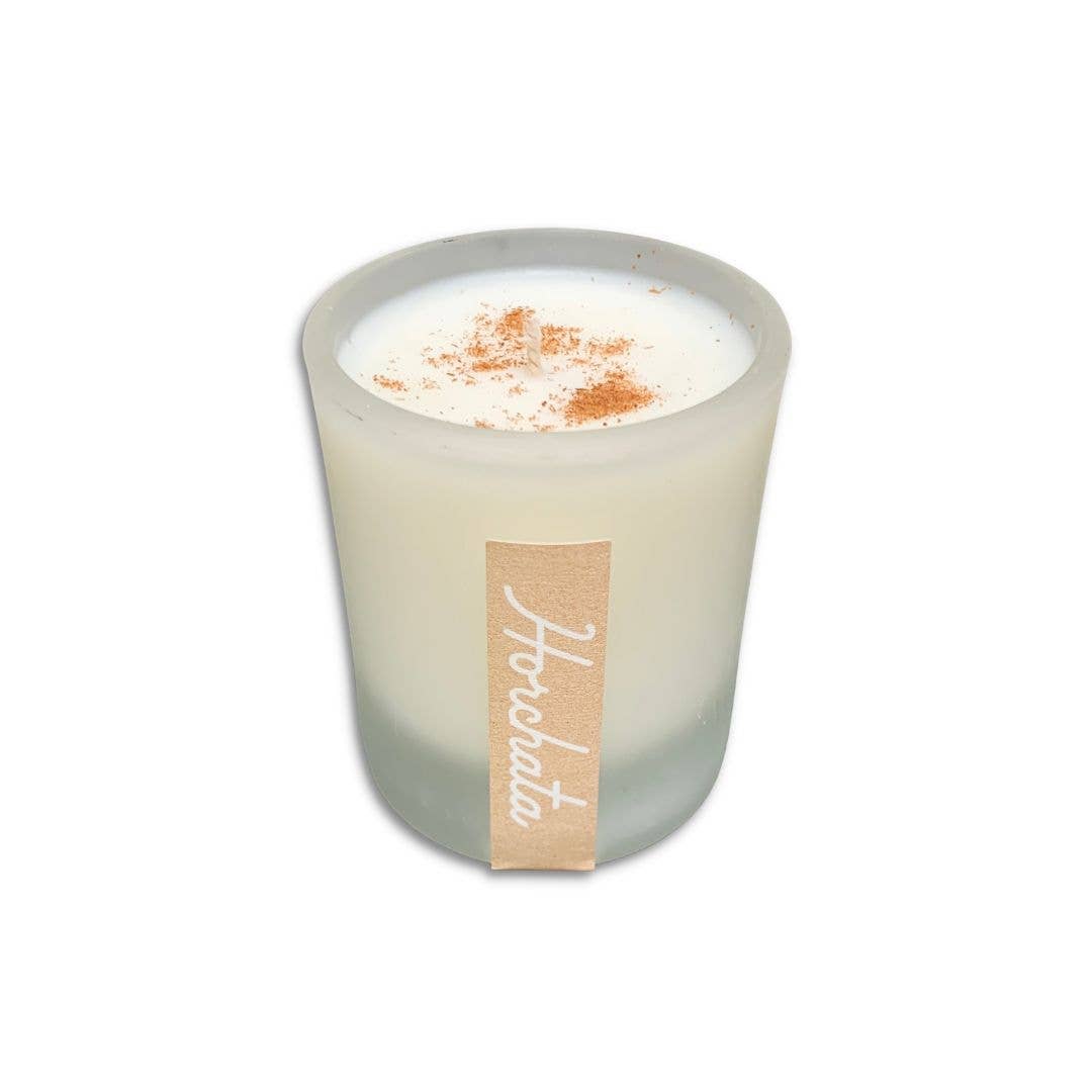 small frosted glass candle with a brown brand label that says horchata in white lettering. Brand: Sin-min