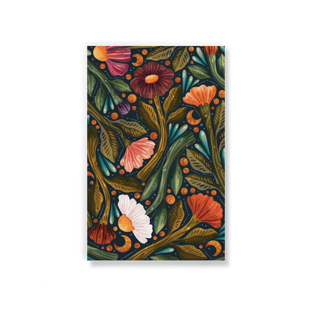 Dark Navy blue notebook with bright jewel colored drawings of various flowers.