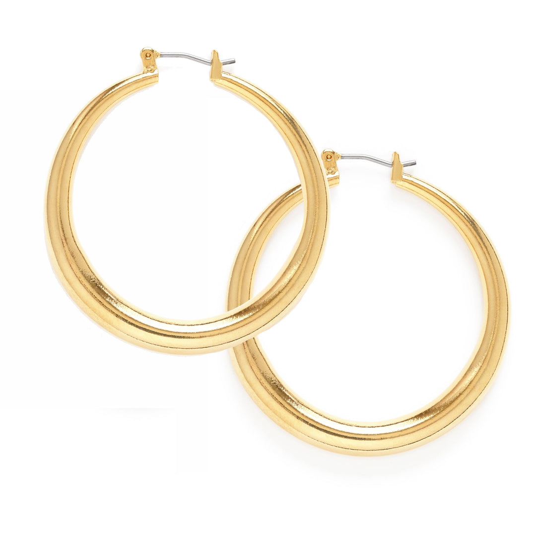 set of gold hoop earrings. Brand: Amano Studio